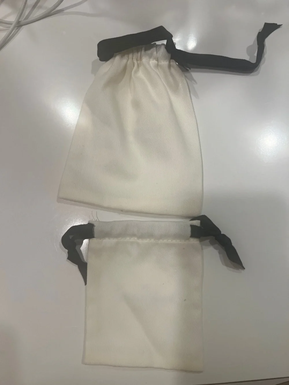 kate spade Cream Drawstring Jewelry Pouches with Black Ribbon (2)